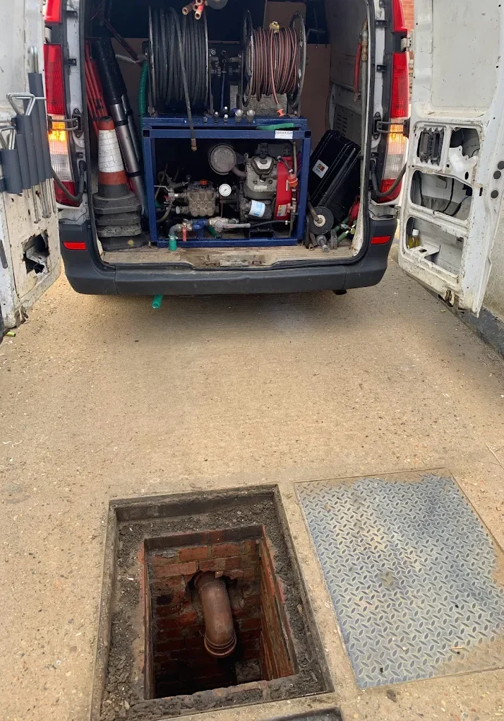 Professional drain cleaning equipment in a van for effective drainage solutions.